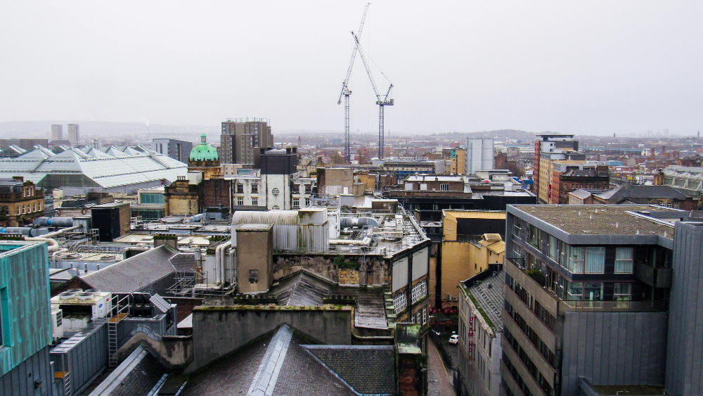 Glasgow city centre rooftops of multiple old residential and modern buildings